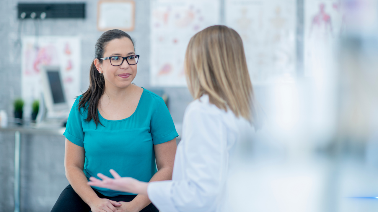 Doctor talking to patient.